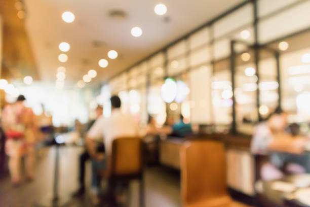 istock Restaurant cafe or coffee shop interior with people abstract defocused blur background 962387380