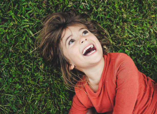 istock Girl in the Grass 962387382