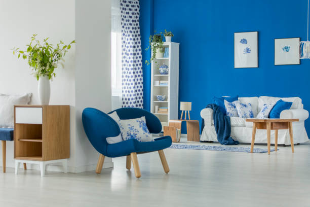 istock Armchair in blue living room 962387826