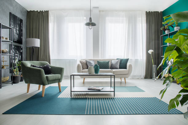 istock Green bright living room interior 962387848