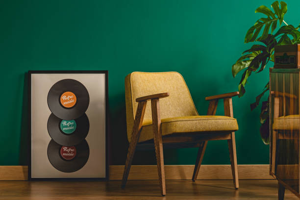 istock Music poster next to armchair 962387864