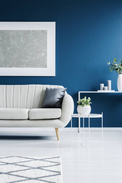 istock Leather couch and big painting 962387880