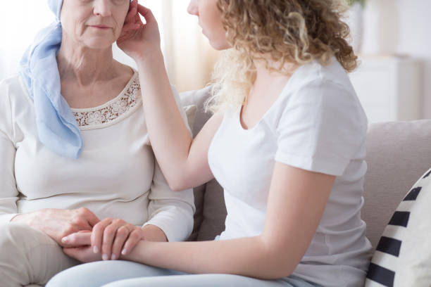 istock Girl supporting sick mother 962387912