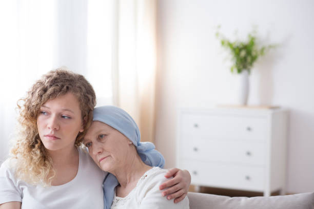 istock Sad girl and sick mom 962387918
