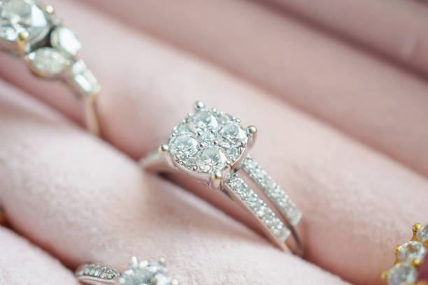 istock Gold and silver diamond ring in luxury jewelry box 962388334