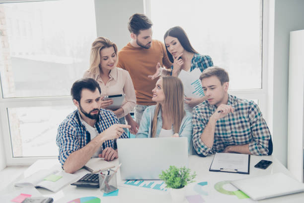 istock Attractive, stylish financiers in casual outfits trying to find solution, decision, solving problem, expressing opinion, mind, view, working on project, start up, presentation 962388470