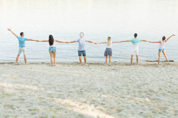 istock Group of people on the beach 962391928