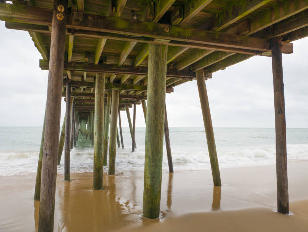 istock Beautiful pier with a cloudy sky, Virginia beach, VA, USA 962402990