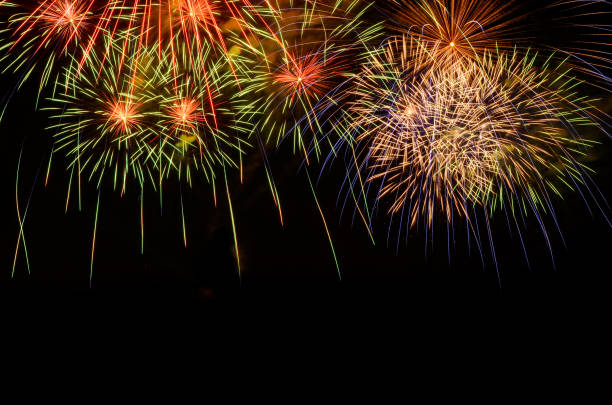 istock Colorful fireworks celebration and the night sky background. 962404022