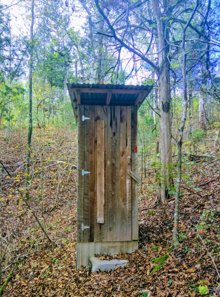 istock Wooden Outhouse 962408286