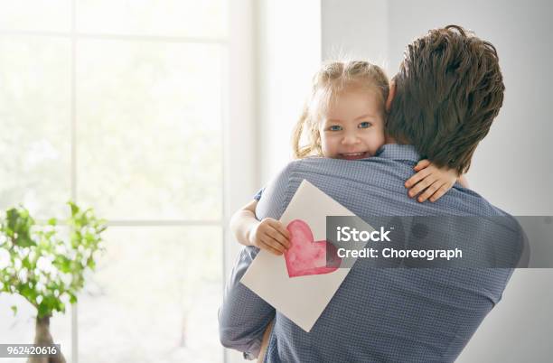 Daughter Congratulating Dad Stock Photo - Download Image Now - Father, Father's Day, Child