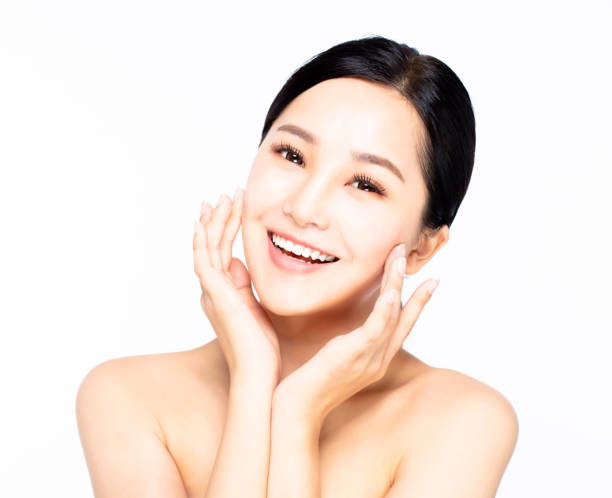 istock close up asian smiling young beauty face 962425130