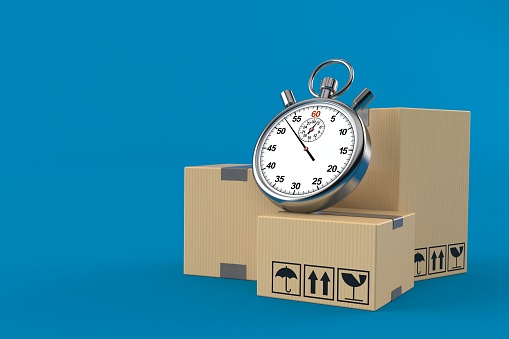 Stack of boxes with stopwatch on blue background. 3d illustration