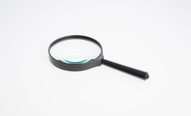 istock Magnifying Glass or Magnify on a background 962430110