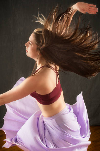 istock Beautiful young dancer in motion, turning in a Connecticut studio. 962433694