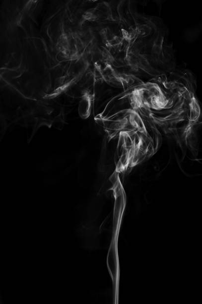 istock Abstract swirl white smoke movement on black. Fantasy smoke 962433782