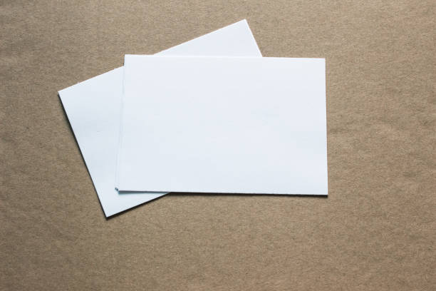 istock Blank portrait mock-up paper. brochure magazine isolated on grey, changeable background / white paper isolated on grey 962435574
