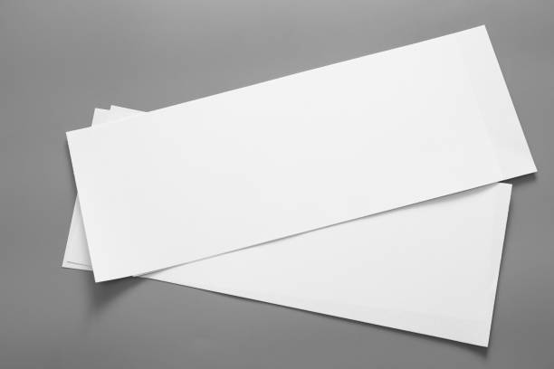 istock Blank portrait mock-up paper. brochure magazine isolated on grey, changeable background / white paper isolated on grey 962440286