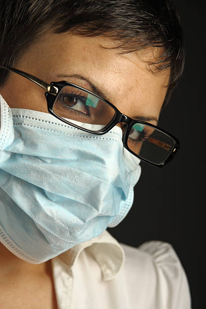 istock woman with medical mask 96244819