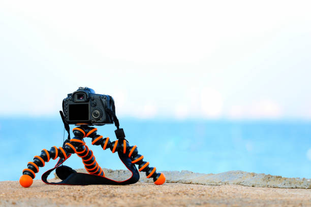 istock camera on tripod for take the photo 962448262
