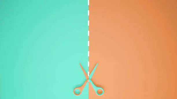 Photo of Scissors with cut lines on pastel turquoise and orange colored background with copy space, template mockup concept idea