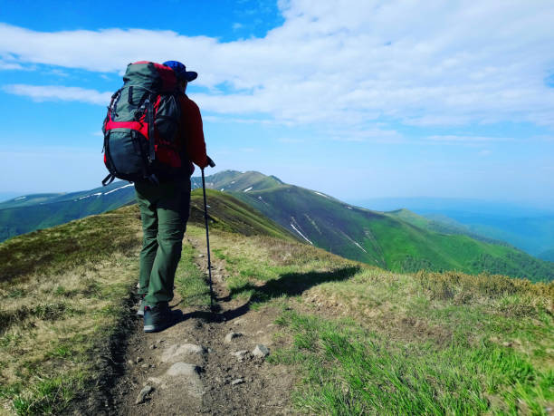 istock Summer hike in Iceland with a backpack and tent. 962452346