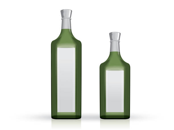 istock transparent glass bottle of wine on a white background 962453468