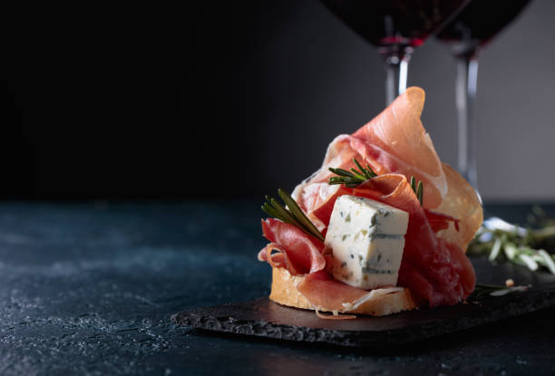 istock Sandwich with prosciutto, blue cheese and rosemary . 962458510