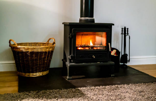 istock Wood burning fireplace with glass door 962459650