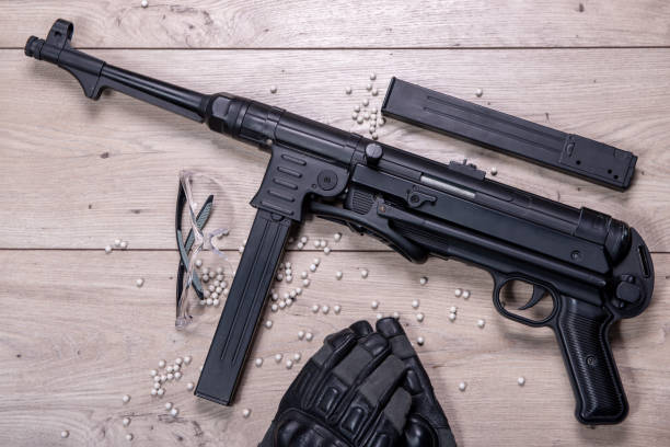 istock air soft gun with protective glasses and a lot of bullets 962465738