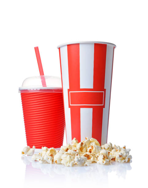 istock Cup of appetizing salty popcorn and take-out blank paper red cup 962467148