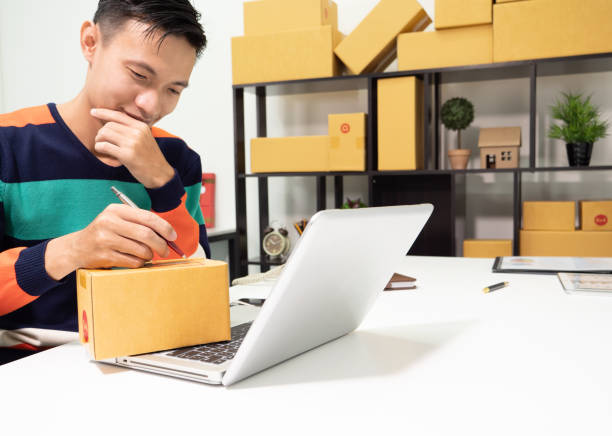 istock Young man owner SME Express delivery service, Small business and ideas making a massive impact online. 962471600
