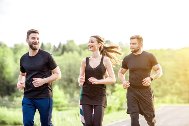 istock Friends jogging outdoors 962476718