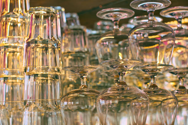 istock Different glassware and drinkware such as glasses and cognac snifters at a bar 962476834