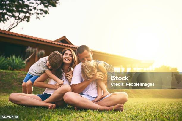 Every Moment Spent Together Is Absolute Bliss Stock Photo - Download Image Now - Family, House, Happiness