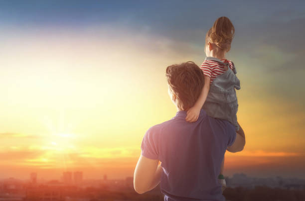 istock family at sunset 962480960
