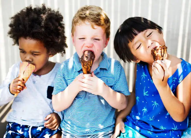 Photo of Children enjoying with ice cream
