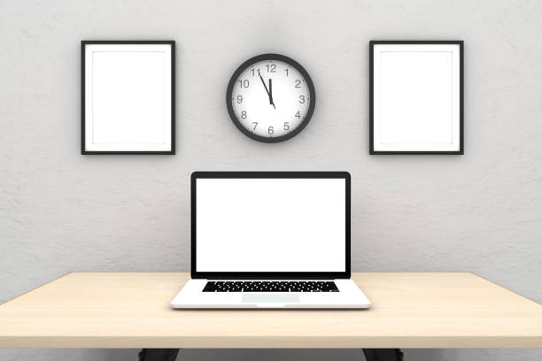 istock Laptop with blank screen on wooden desk 962485982