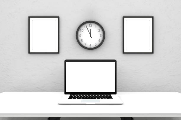 istock Laptop with blank screen on white desk 962486046