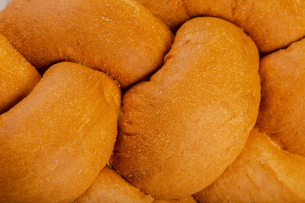 istock Freshly baked bread on a wooden background 962486836