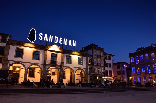 Gaia, Portugal - May 19, 2018: Sandeman cellar in the historic centre of Vilanova de Gaia, Portugal. Sandeman is a brand of Port wines founded in 1790.