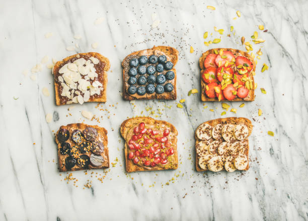 istock Vegan whole grain toasts with fruit, seeds, nuts, peanut butter 962493520