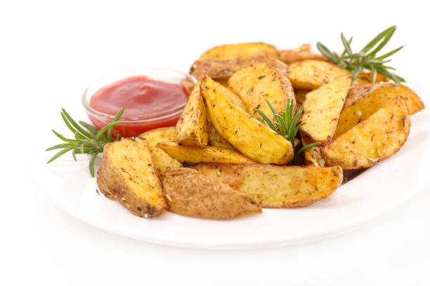 istock roasted potaotes and ketchup 962495738