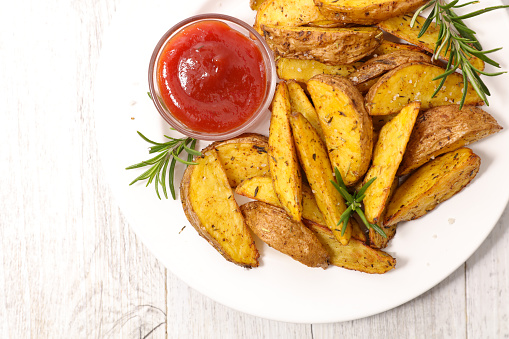 roasted potaotes and ketchup