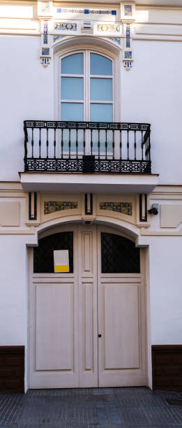 istock Old door with interesting texture, element of architecture, interesting entrance to the building, vintage style 962501928