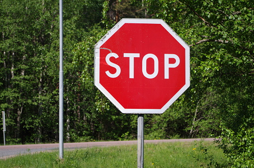 Stop sign on a road in Dalarna