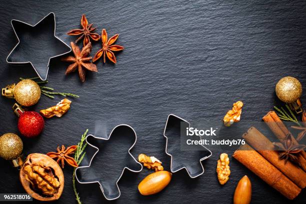 Food Christmas Background For Baking Or Cooking By Spices Nuts And Cookies Cutter Decoration By Red And Gold Glitter Ball With Copy Space Stock Photo - Download Image Now