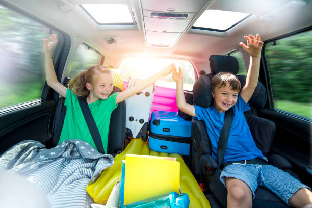 istock Children relax in the car during a long car journey 962518056