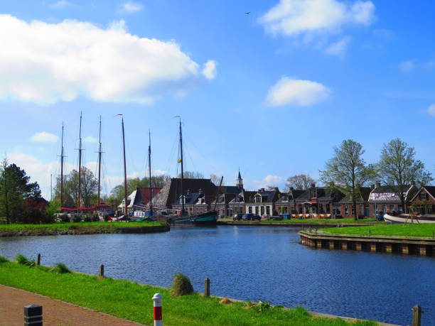 istock Group of sailing ships on Dutch canal 962518182