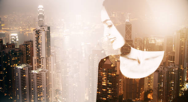istock Woman on city background 962519586